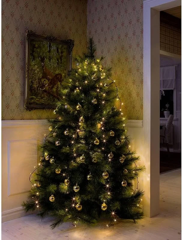 Besuche den Konstsmide-Store Konstsmide LED Baummantel mit Ring, für Weihnachtsbaum, 5 Stränge à 40 Dioden, vormontiert, 200 bernsteinfarbene Dioden, 24V Innentrafo, dunkelgrünes Kabel - 6361-820 — Weihnachtsbeleuchtung
