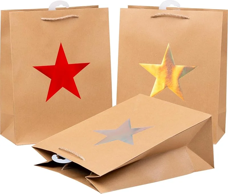 Besuche den Heku-Store HEKU XL-Geschenktaschen mit Metallic Stern-Motiv in 3 Farben (rot, gold, silber) I Hochwertiges Papier I Ideal für Weihnachten und besondere Anlässe I Kordelband inklusive I 33x26x13 cm - 24 Stück Set — Geschenkverpackung